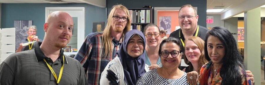 Group photo of happy Action Read members at our Annual General Meeting June 2026.