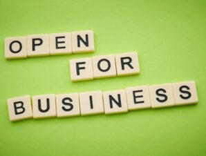 Bright sign that says 'open for business'